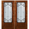 6'-8" Tall Knotty Alder 3/4 Lite Double Doors with Valencia Wrought Iron Grille